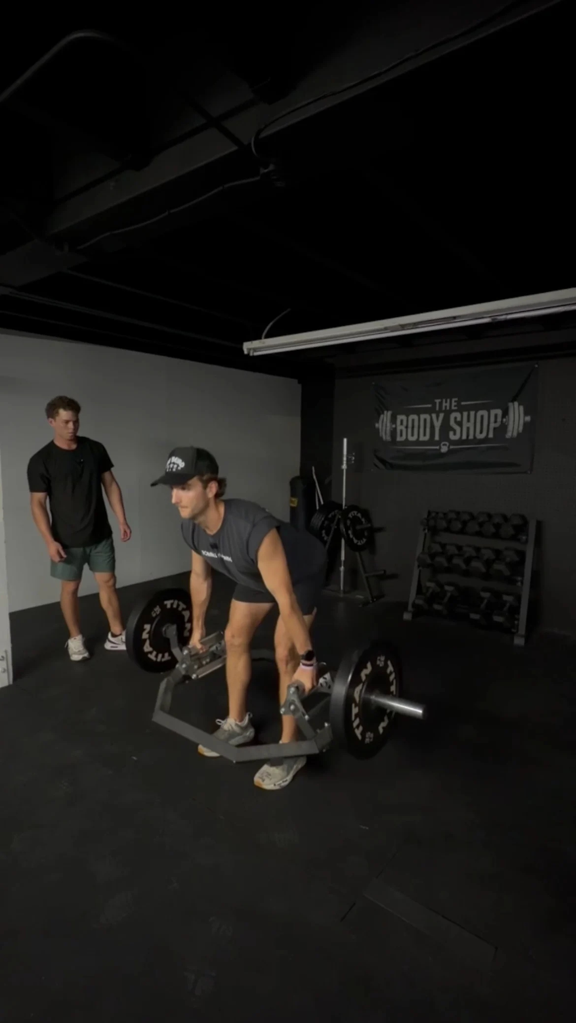 An athlete performing a trap bar deadlift in The Body Shop strength room